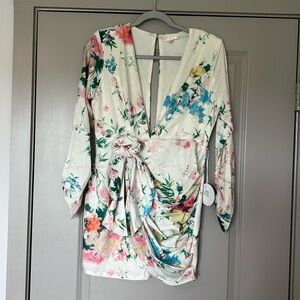 A women’s semi formal floral mini dress